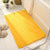 tapis-salle-de-bain-jaune